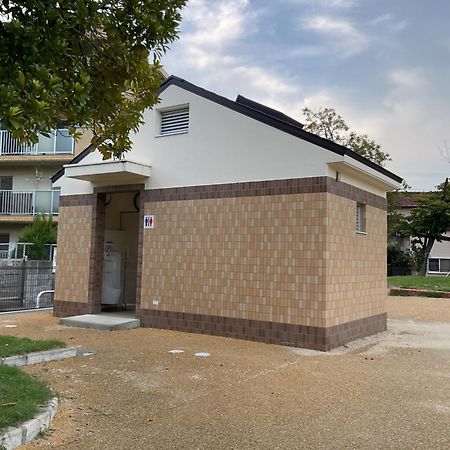Ferienwohnung ザミッキーカールトン井尻102 Shiobaru Exterior foto