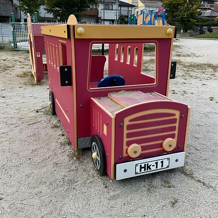 Ferienwohnung ザミッキーカールトン井尻102 Shiobaru Exterior foto