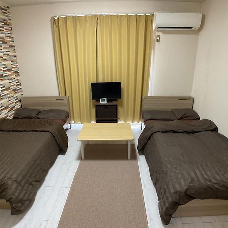 Ferienwohnung ザミッキーカールトン井尻102 Shiobaru Exterior foto