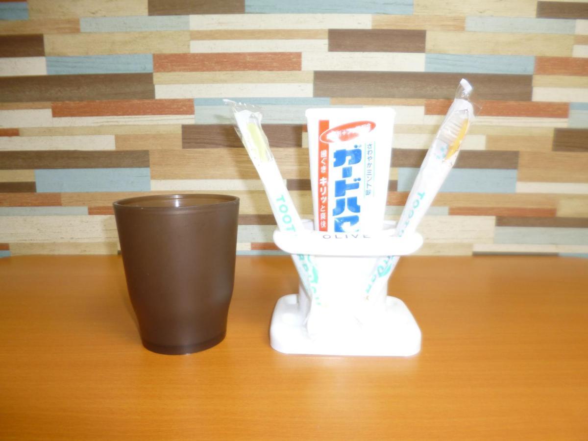 Ferienwohnung ザミッキーカールトン井尻102 Shiobaru Exterior foto