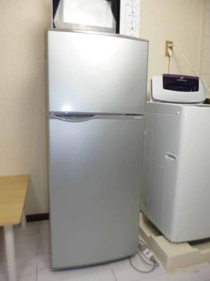 Ferienwohnung ザミッキーカールトン井尻102 Shiobaru Exterior foto