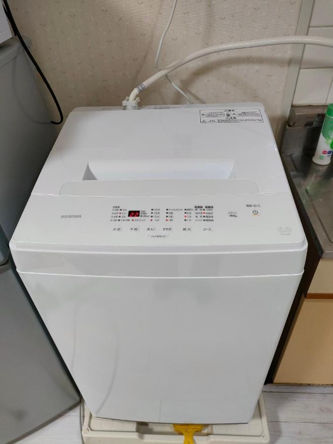 Ferienwohnung ザミッキーカールトン井尻102 Shiobaru Exterior foto