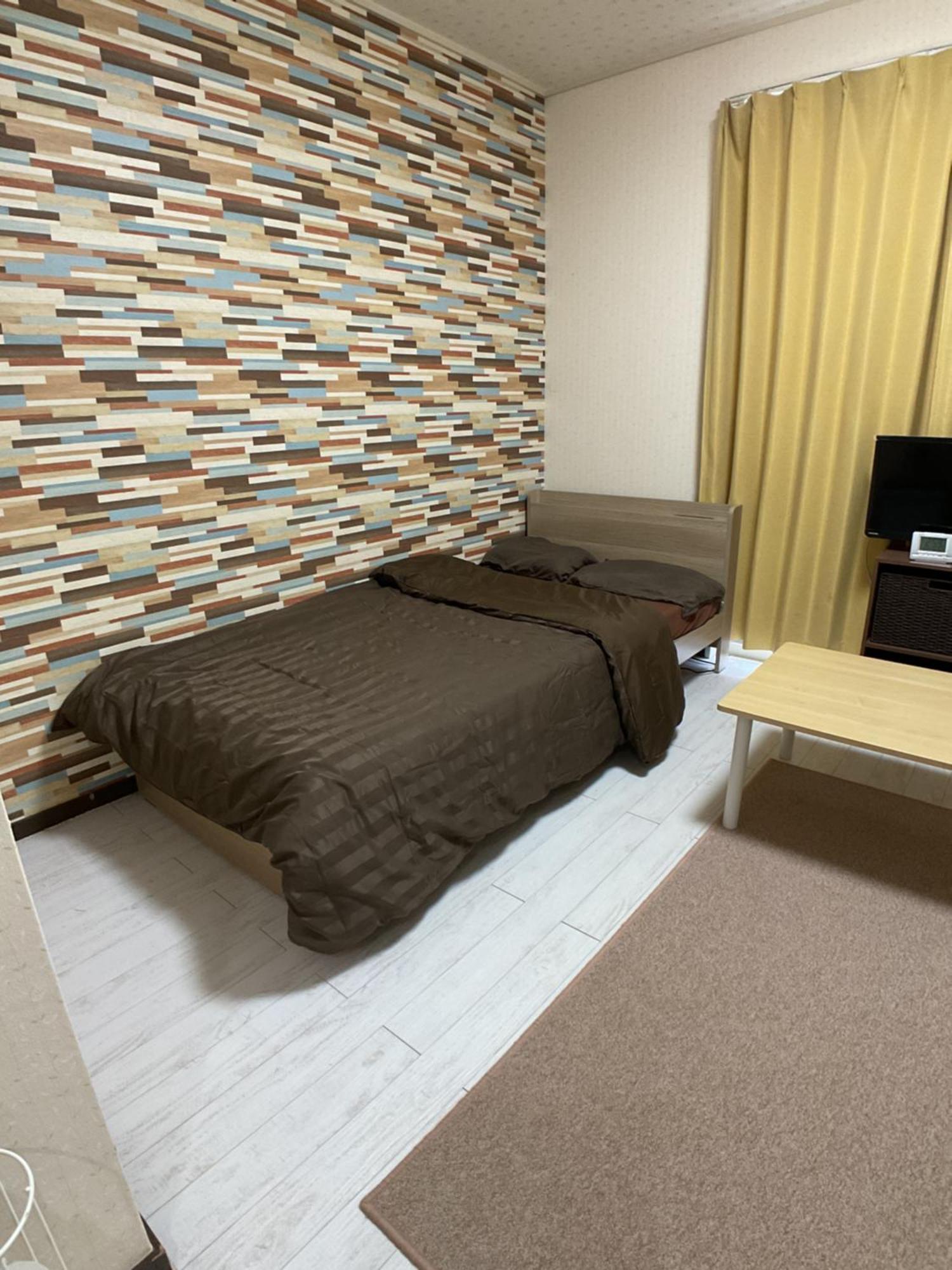 Ferienwohnung ザミッキーカールトン井尻102 Shiobaru Exterior foto